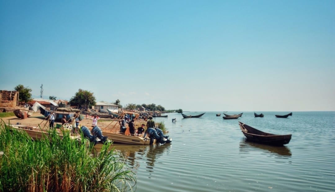 The fishing village of Vitshumbi. The two boats in the foreground are Virunga National Park ranger patrol boats.