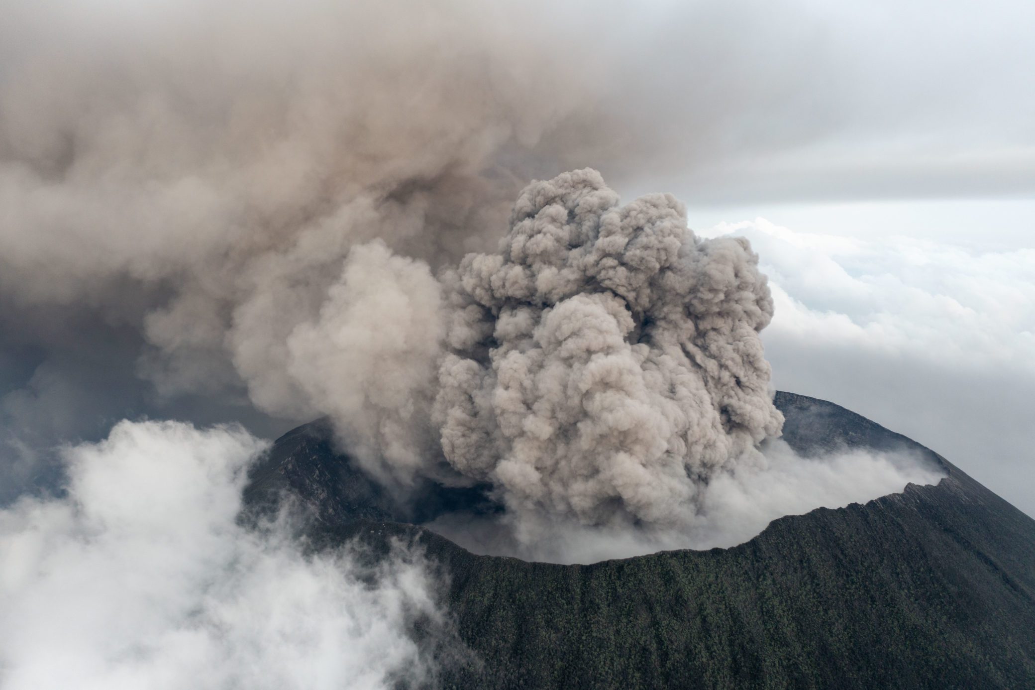 Mt Nyiragongo eruption in 2021 drone image showing ash from the top of the volcano by photographer Christopher Horsley