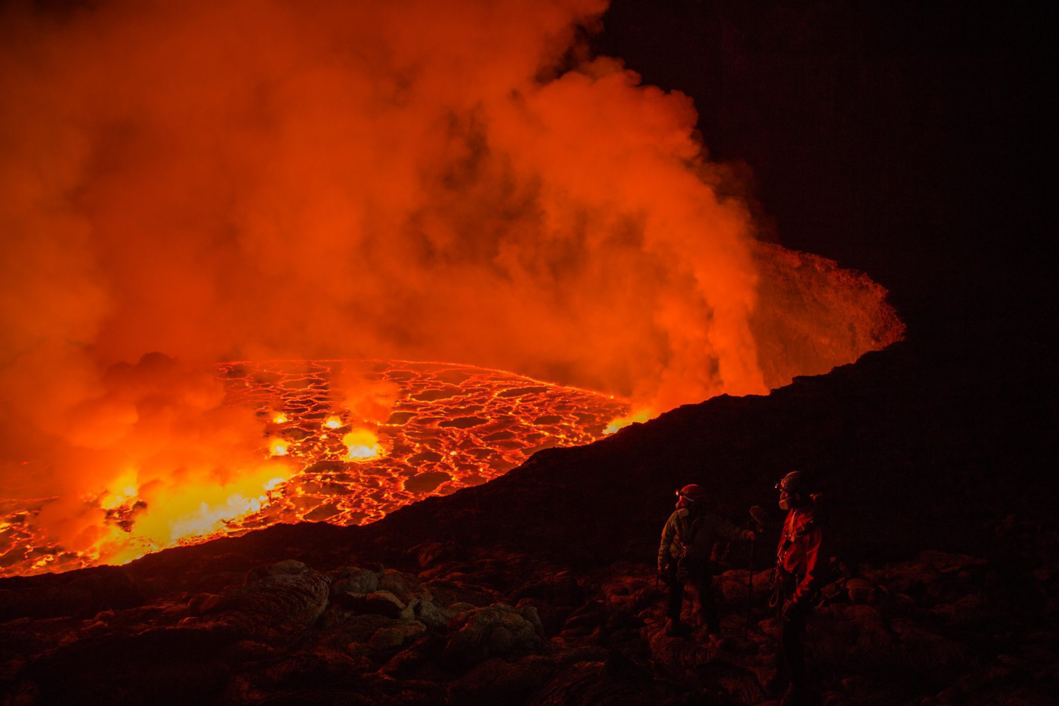 Researchers on the edge of the Nyiragongo crater